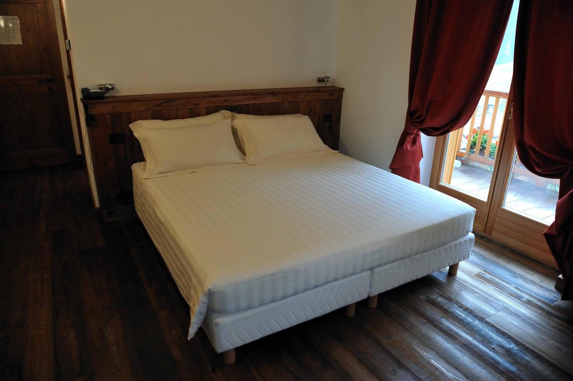Ellex Eco Hotel Грессоней-ла-Трините Номер фото
